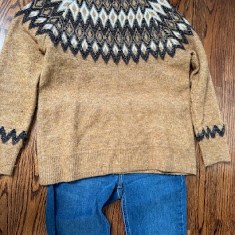 Gold and Black Crewneck Sweater with Geometric Pattern.
